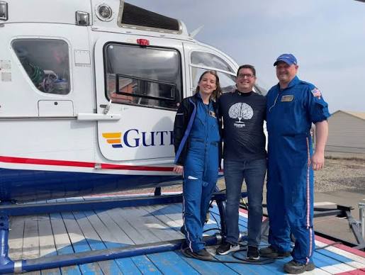 Tim standing with members of the life flight team